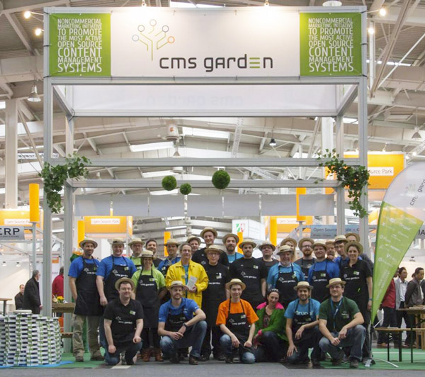 Team photo with 27 volunteers at a trade fair stand